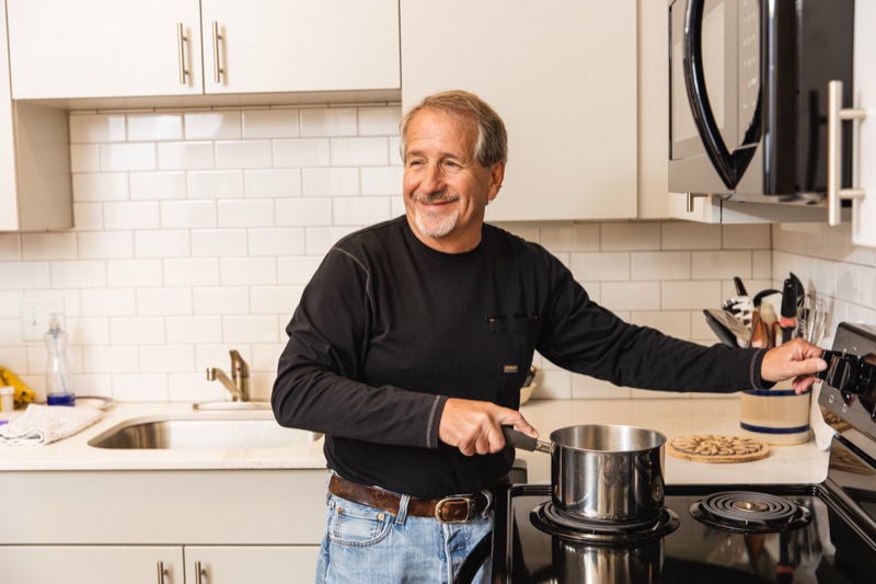 Man cooking in his apartment